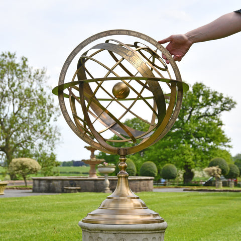 Antique Brass Armillary Sundial in Garden 