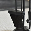 Black broom and dustpan set on a light-colored floor.