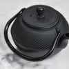 Black Japanese teapot lid on
