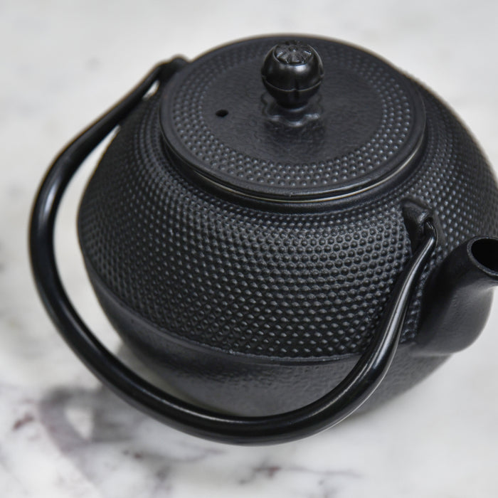 Black Japanese teapot lid on