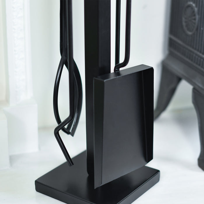 Close Up Of Contempoary Black Shovel and Tongs