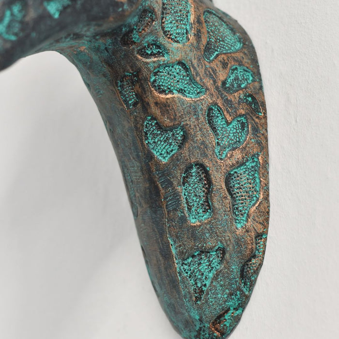 Close up of Spots on Verdigris Giraffe Bust
