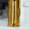 Close Up Of Brushed Brass Matchstick Holders Base
