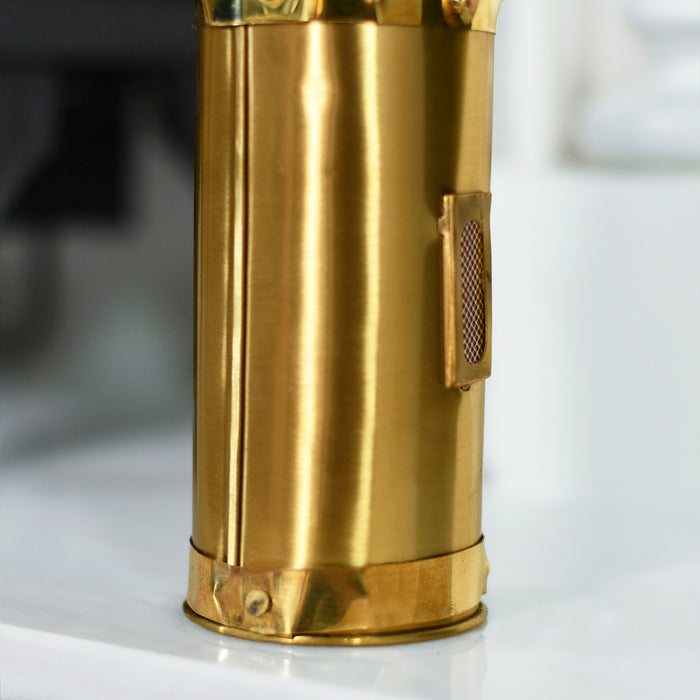 Close Up Of Brushed Brass Matchstick Holders Base