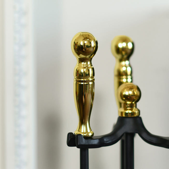Close Up Of Gold Handles On Fireside Tools Set 