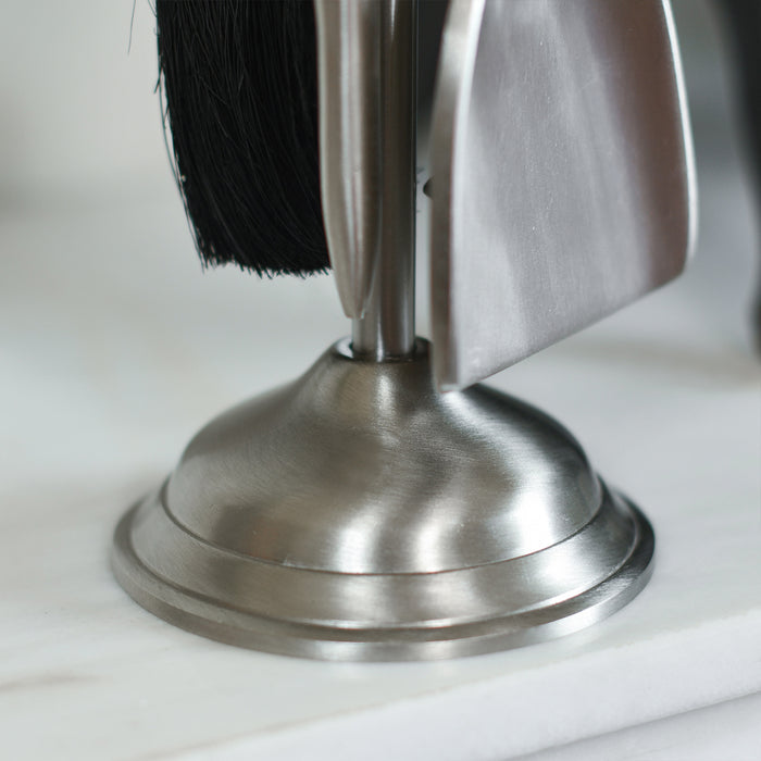 Close Up Of Rounded Silver Base and Tools