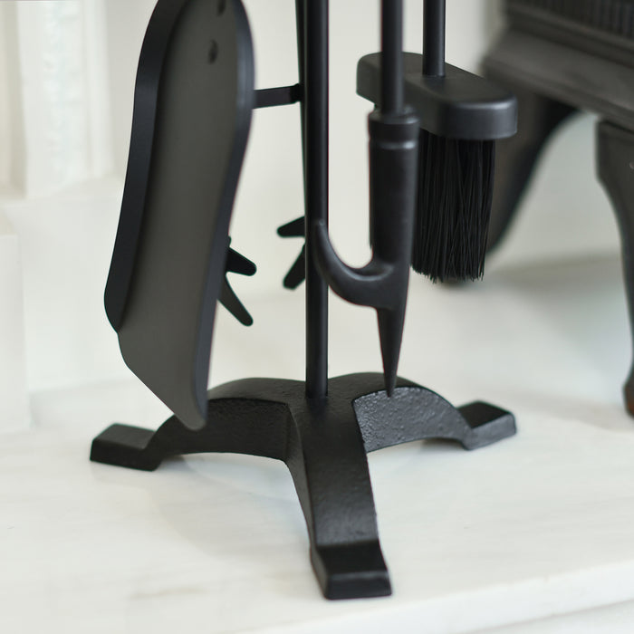 Close Up of Fireside Tools on Three Pronged Black Stand 