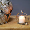 Close up of apple candle holder and lit  candle 