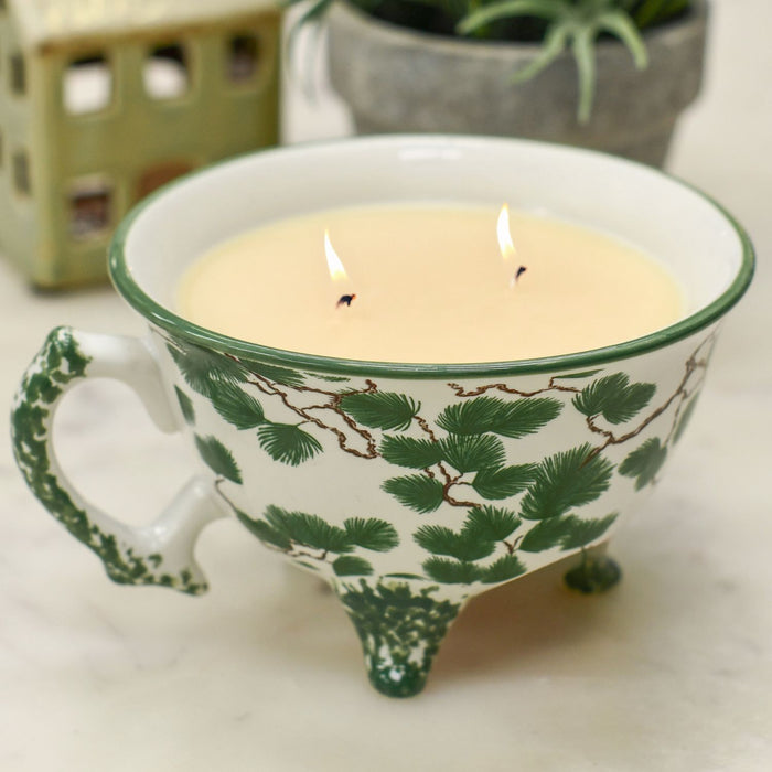 Lit Candle in Decorative Ceramic Cup 