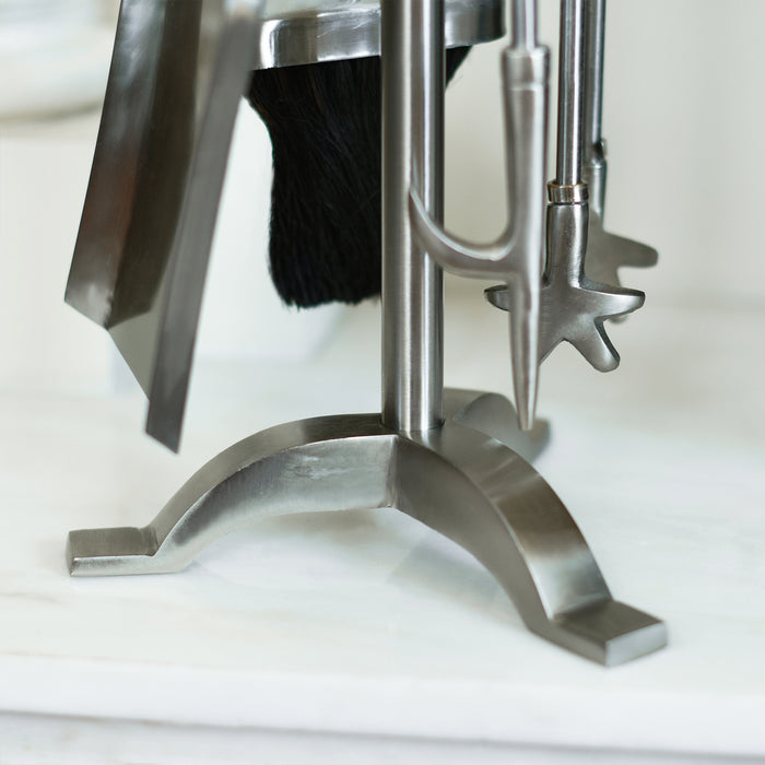 Silver Four Tools and Three Pronged Stand 