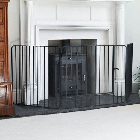 black fire Guard in front of log burner