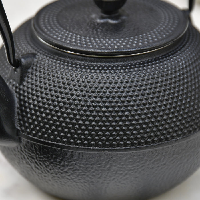 Close Up of Textured Black Teapot 