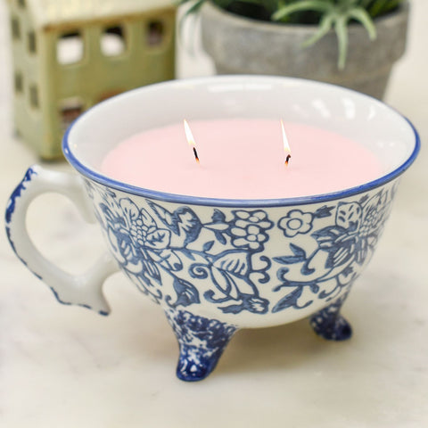 Floral Ceramic Teacup with Lit Candle