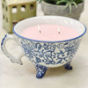 Floral Ceramic Teacup with Lit Candle