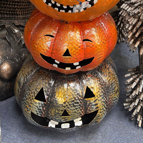 Stack of Four Metal Pumpkins