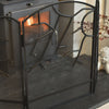 Black metal fireplace screen with a fire burning inside